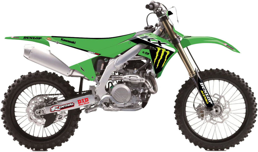 DCOR Complete Kit 23 Mek Klx 110 graphics and decals in black, featuring bold designs for dirt bikes, shown on a vehicle.