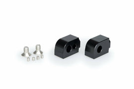 Black PUIG passenger footpeg adaptor for Suzuki motorcycle, designed to enhance foot control comfort and style.