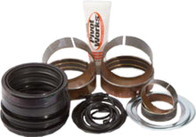 Load image into Gallery viewer, Pivot Works suspension seal and bushing kit for forks, showing various seals and bushings organized on a white background.