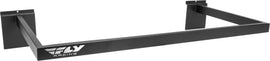 Fly Racing U Hanger Bar Fixture 2-Pack mounted on a wall, showcasing durable metal construction for motorcycle gear organization.