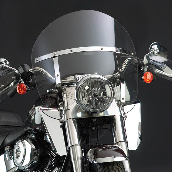 National Cycle Switchblade chopped clear softail windshield mounted on a motorcycle, providing wind protection and stylish design.