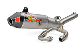 Pro Circuit Ti-6 exhaust system with carbon cap installed on a motorcycle, showcasing its sleek titanium design and branding.