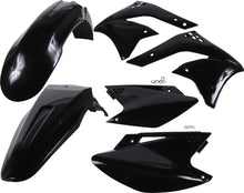 Load image into Gallery viewer, Acerbis black plastic kit for motorcycle, featuring various plastic panels and parts laid out on a white background.