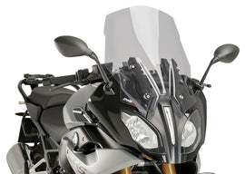 PUIG touring smoke windscreen for motorcycle, clear aerodynamic windshield with dark smoke tint, designed for touring bikes.