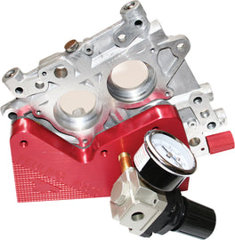Feuling Camplate Psi Tester tool for engine camshaft testing, featuring a compact metal design with measurement gauges.