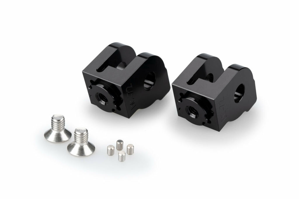 Black PUIG footpeg adaptor for Ducati rider foot controls, featuring durable metal construction and mounting hardware.