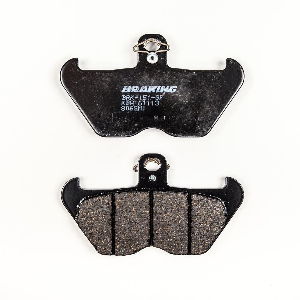 Semi-metallic Braking Brake Pad Set by Braking with multiple pads and mounting hardware for vehicle brake system.