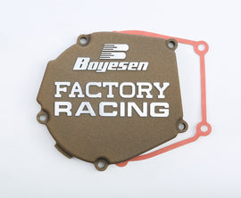 Boyesen Factory Racing magnesium ignition cover for street bikes, showcasing a sleek, durable design with brand logo and mounting details.