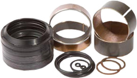 Pivot Works suspension seal and bushing kit for forks, showing various seals and bushings arranged on a white background.