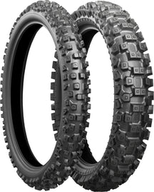 Bridgestone Battlecross X30 rear motorcycle tire 90/100-16 bias Tt 52m for off-road riding, showing tread pattern and sidewall details.