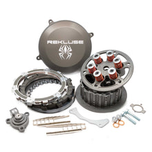 Load image into Gallery viewer, Rekluse Radius Cx clutch hon with metallic clutch components and hydraulic mechanism, designed for high-performance motorcycle use.