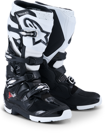 Alpine Star Tech 7 Enduro motorcycle boots in black and white, size 8, with sturdy design and protective features.