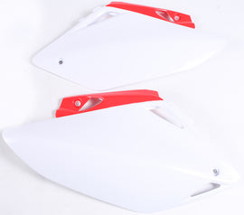 Acerbis white side panels for motorcycle, featuring sleek design and durable plastic construction.