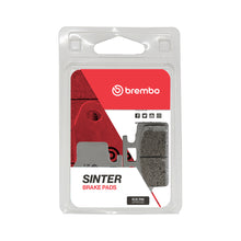 Load image into Gallery viewer, Brembo Sx brake pads, sintered upgrade for enhanced braking performance, shown with detailed metal surface and brake pad structure