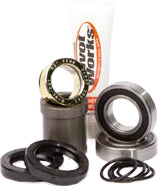 Pivot Works waterproof rear wheel collar kit for KTM drive system, showing black metal collars and mounting components.