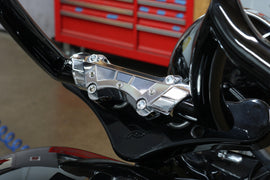 Chrome 1-inch Super Riser Clamp with Wing design by BAGGERNATION for motorcycle handlebars.