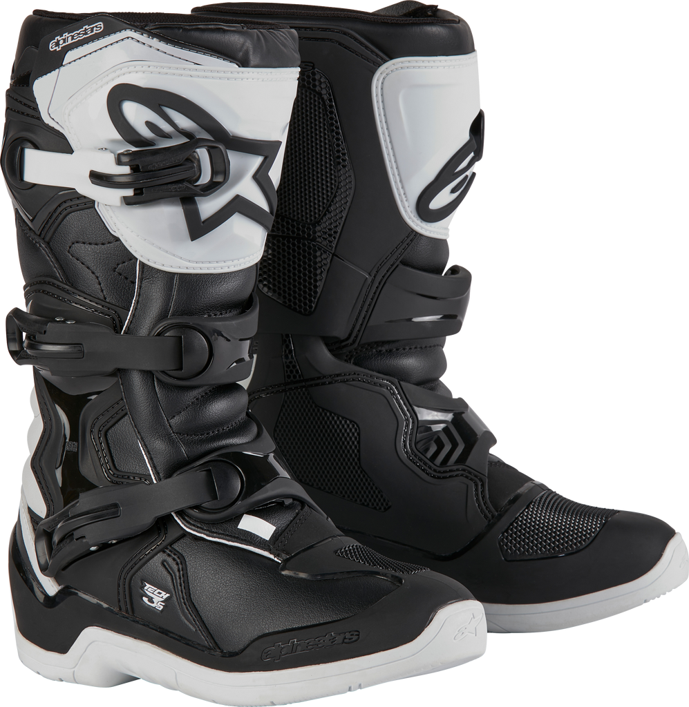 Alpine Star Tech 3s youth motocross boots in white and black, size 4, showing the sturdy design and branding.