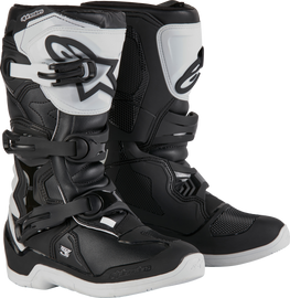Alpine Star Tech 3s youth motocross boots in white and black, size 8, showing the sturdy design and protective features.