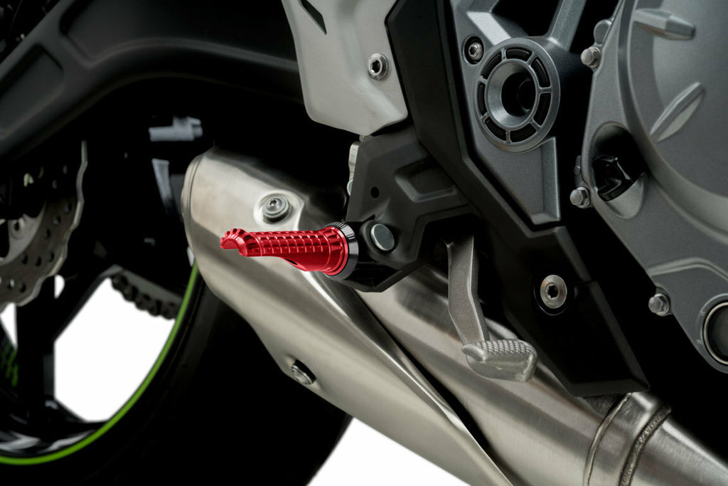 PUIG R-Fighter Red footpegs for motorcycle foot controls, featuring durable design and vibrant red color.