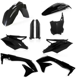 Acerbis full plastic kit in black, featuring various plastic motorcycle body panels and components on a neutral background.