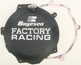Boyesen Factory Racing clutch cover in black, designed for durability and performance, shown on a motorcycle engine.