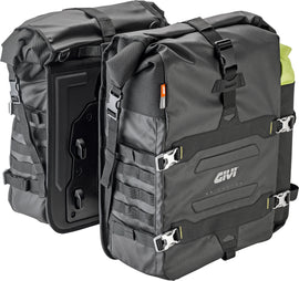 GIVI GRT709 waterproof saddle bags, 35-liter motorcycle luggage with reflective accents and secure straps, mounted on a bike.