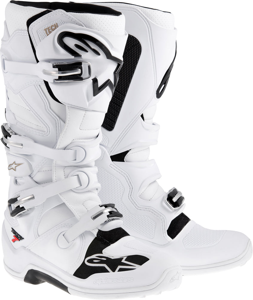 Alpine Star Tech 7 motocross boots in white, size 13, showing the sturdy design and secure straps of this off-road footwear.