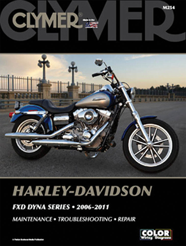 Clymer Repair Manual for Harley-Davidson Dyna 27-M254, showing detailed tools and diagrams for motorcycle maintenance.