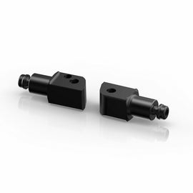 Black RIZOMA footpeg mount kit for passenger use, showcasing sleek metal components on a motorcycle.