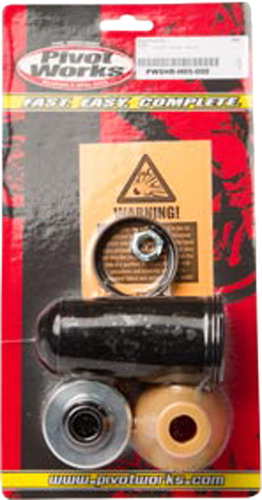 Pivot Works Shock Repair Kit 52-12054 for suspension, includes seals and components, shown laid out on a white background.