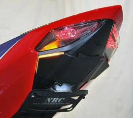 New Rage Cycles Fender Eliminator body kit for Honda HON 565-0060 motorcycle, showcasing sleek design and mounting features.