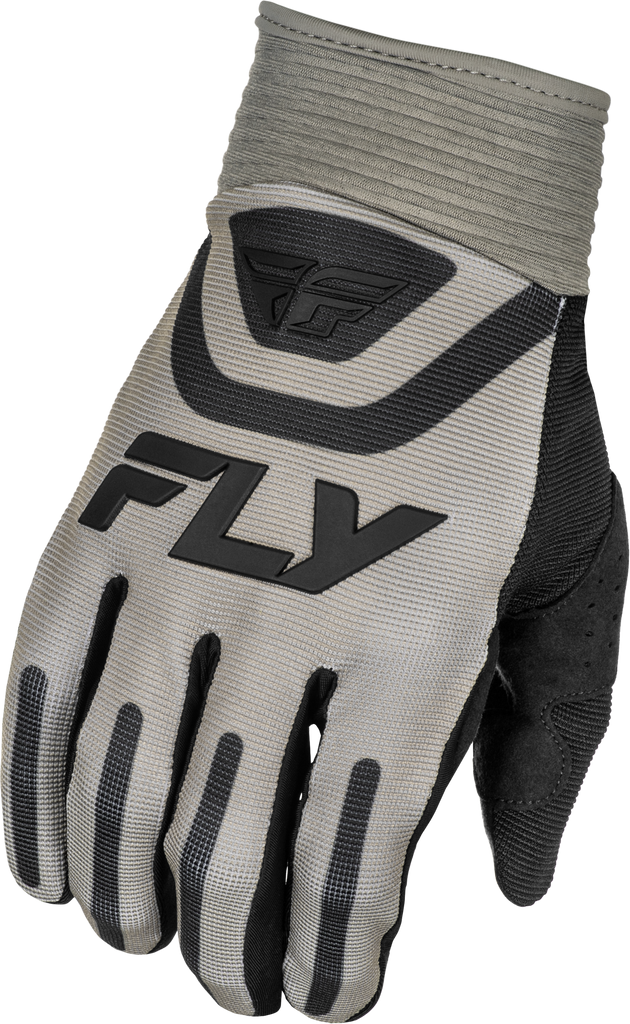 Fly Racing F-16 gloves in grey and black, showing the padded design and adjustable wrist strap for motorcycle riding comfort.
