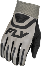 Load image into Gallery viewer, Fly Racing F-16 gloves in grey and black, showing the padded design and adjustable wrist strap for motorcycle riding comfort.