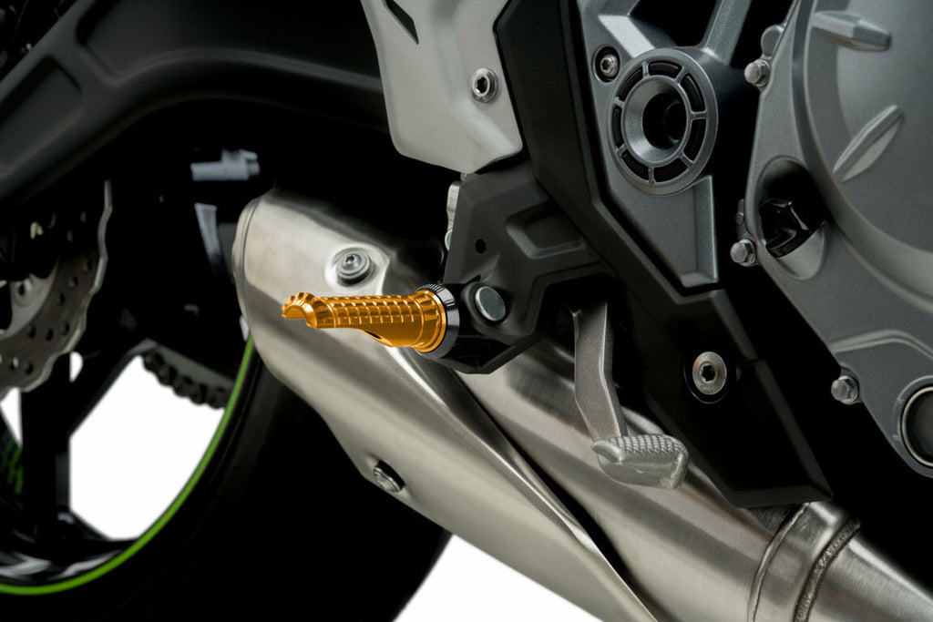 PUIG R-Fighter Gold footpegs for motorcycle foot controls, featuring a sleek gold finish and durable metal construction.