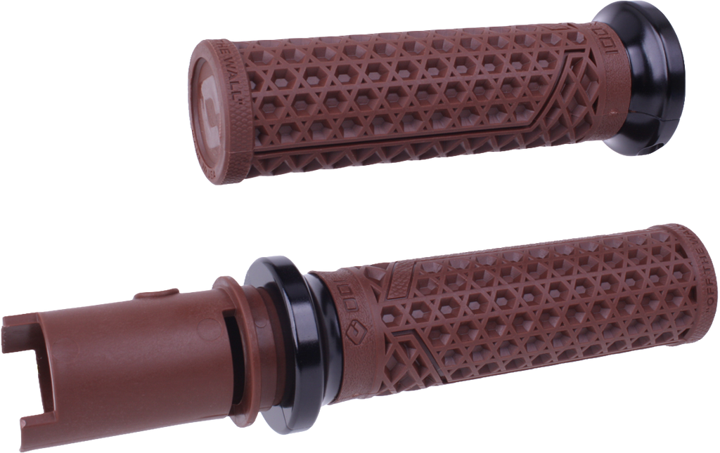 ODI Grips Van'S Lock-On grips in brown and black for motocross bikes, with textured rubber surface and locking mechanism.