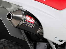 Yoshimura RS-2 exhaust header, canister, and end cap system in stainless steel, designed for high-performance motorcycle exhaust.