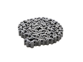 ProX Racing Parts cam chain for Yamaha engine, showing the metal chain with links and tensioner components.