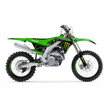 Load image into Gallery viewer, DCOR Street skateboard complete kit featuring Monster Energy Slash White background design with deck, trucks, and wheels.