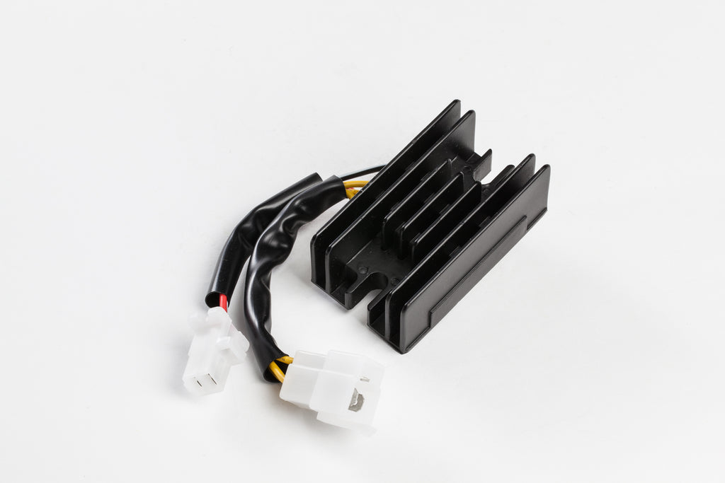 Ricks Motorsport Electric electrical rectifier and regulator for motorcycle, showing metal housing and electrical connectors.
