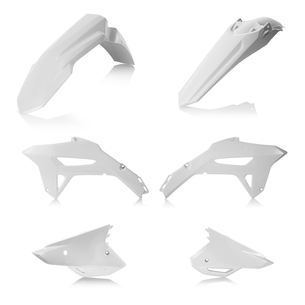 Acerbis plastic body kit in white, including various panels and parts for motorcycle or dirt bike assembly.