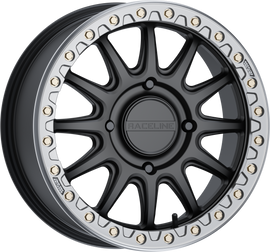 Raceline Alpha Bdlk 17x7 black and gunmetal alloy wheel for Can-Am Maverick with 4/137 bolt pattern and +40mm offset.