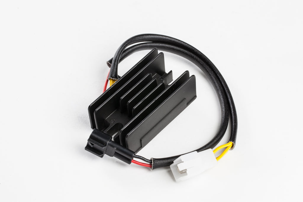 Ricks Motorsport Electric regulator and rectifier for motorcycle electrical systems, with wiring connectors visible.