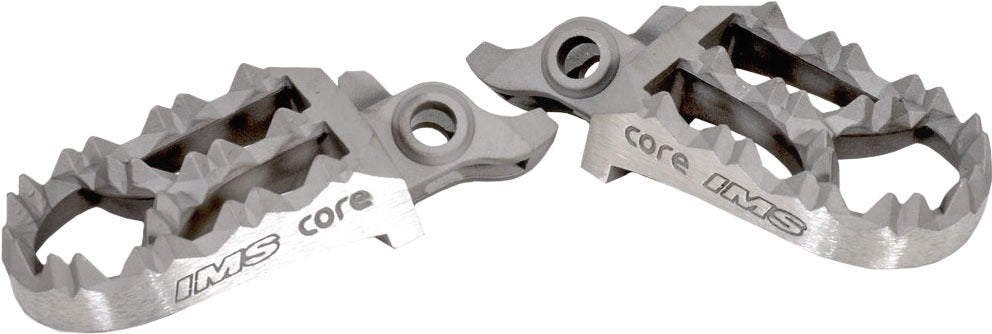 IMS Core Mx footpegs for motorcycle foot controls, featuring durable construction and a textured surface for grip.