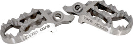 IMS Core Mx footpegs for motorcycle foot controls, featuring durable construction and a textured surface for grip.