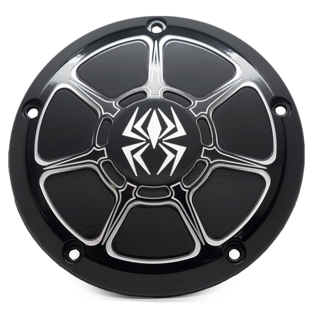Rekluse black gloss Derby Cover engine part for Big Twin 99-17 Ex Low Profile motorcycle, showcasing sleek black finish and detailed design.