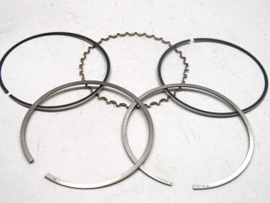 Namura 73.95mm piston rings for Kaw engines, compatible with Namura pistons, part 186-2002R, showing close-up of piston ring set