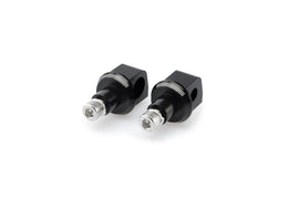Black PUIG footpeg adapter for Kawasaki motorcycle foot controls, part number 561-06451BK, shown on the motorcycle.