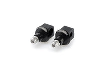 Load image into Gallery viewer, Black PUIG footpeg adapter for Kawasaki motorcycle, part of the foot controls system, with mounting hardware visible.