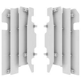 White Polisport Plastics radiator louvers for motorcycle, model 64-56529, with vented design and durable plastic construction.