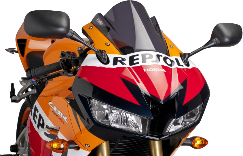 PUIG racing dark smoke windshield for motorcycle, featuring tinted, aerodynamic design with mounting hardware visible in the image.